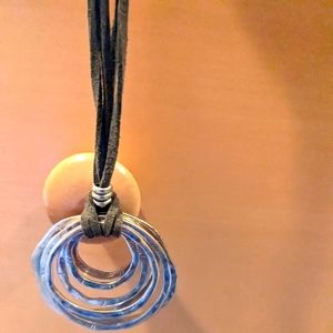 Gold tone Dressbarn necklace on green cord necklace